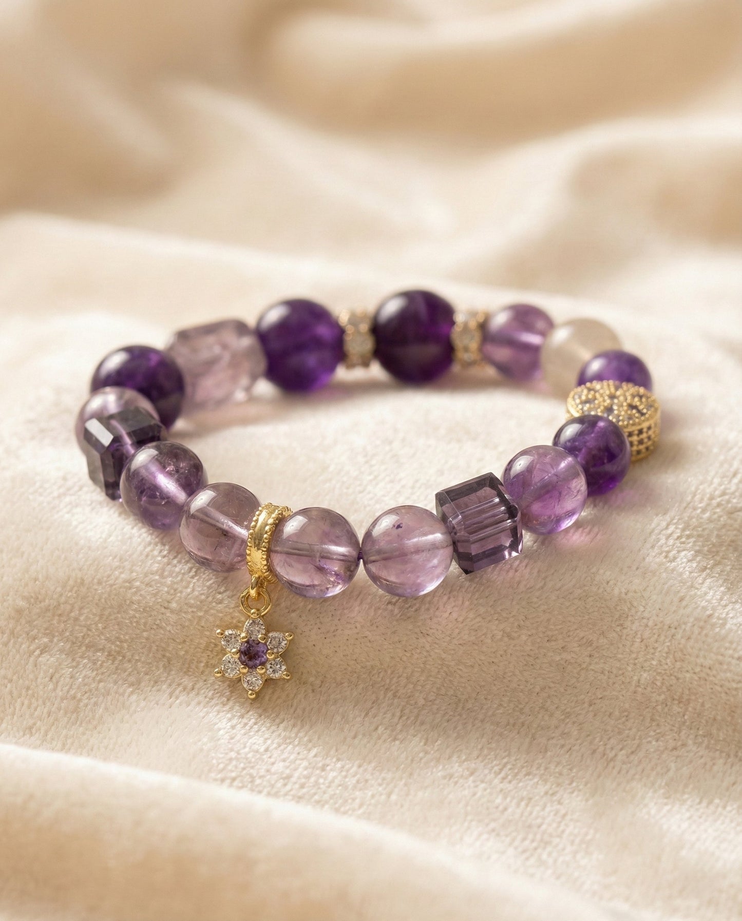 The Crown Sovereign Bracelet, shown at a gentle angle on a light velvet surface.