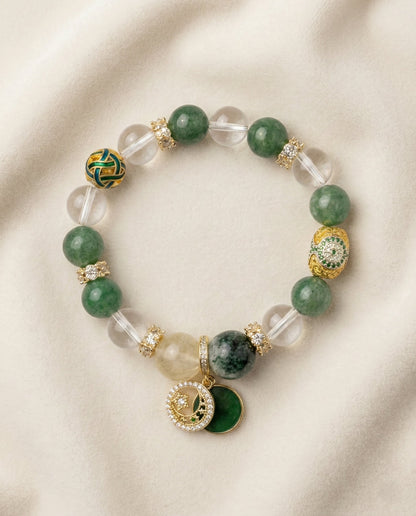 The Abundance Flow Bracelet, photographed from above on a light velvet background.