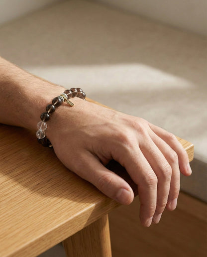 The Grounded Anchor Bracelet worn naturally on the wrist in a relaxed setting