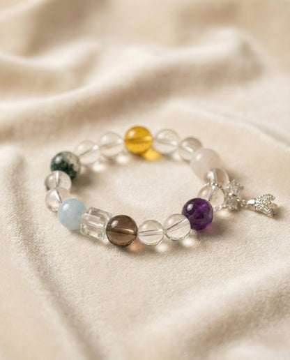 The Prism Harmony Bracelet, shown at a gentle angle on a light velvet surface.
