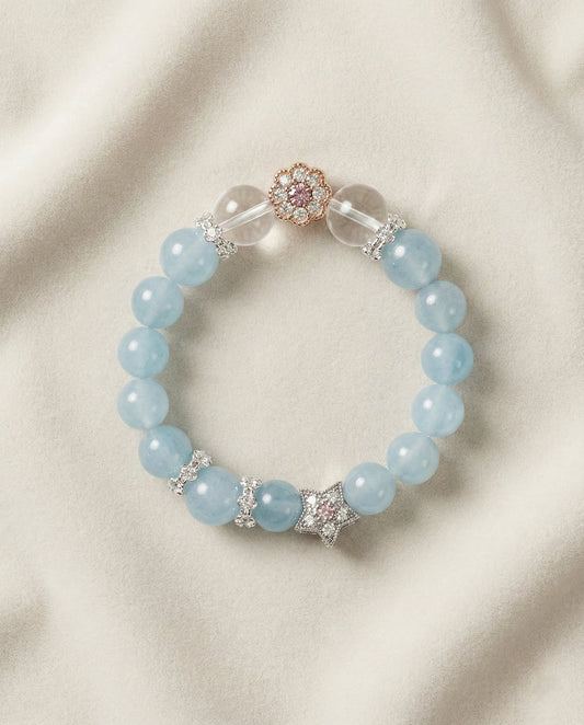 The Serene Whisper Bracelet, photographed from above on a light velvet background.