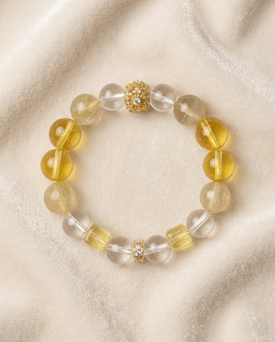 The Solar Ascendant Bracelet, photographed from above on a light velvet background.