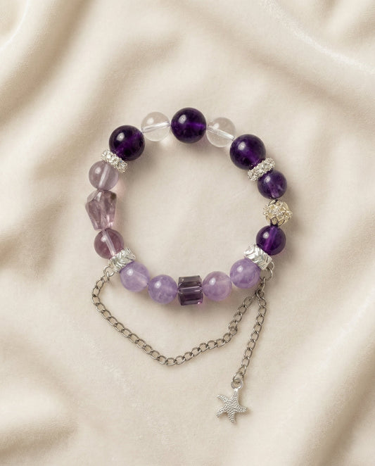 The Visionary Bracelet, photographed from above on a light velvet background.