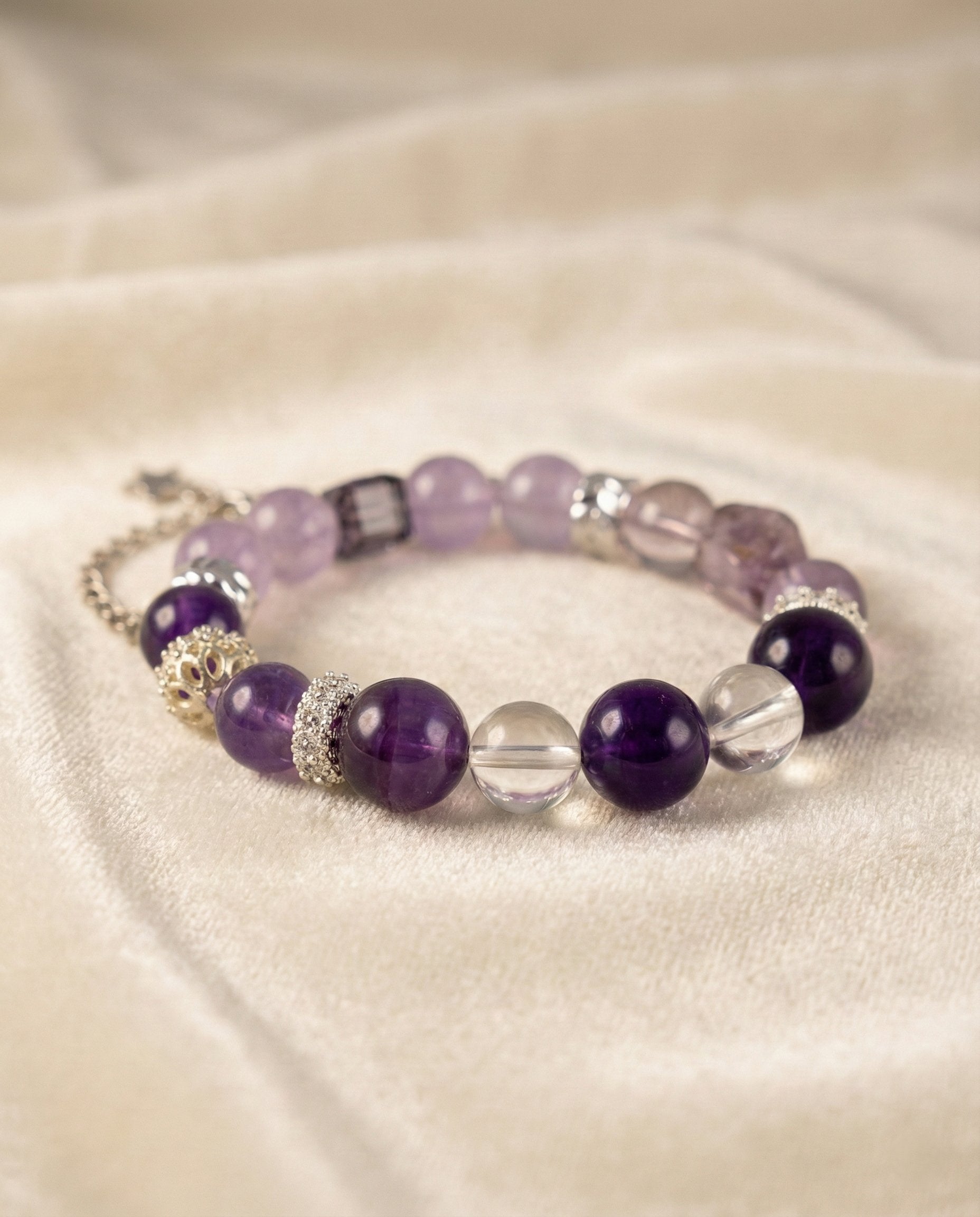 The Visionary Bracelet, shown at a gentle angle on a light velvet surface.